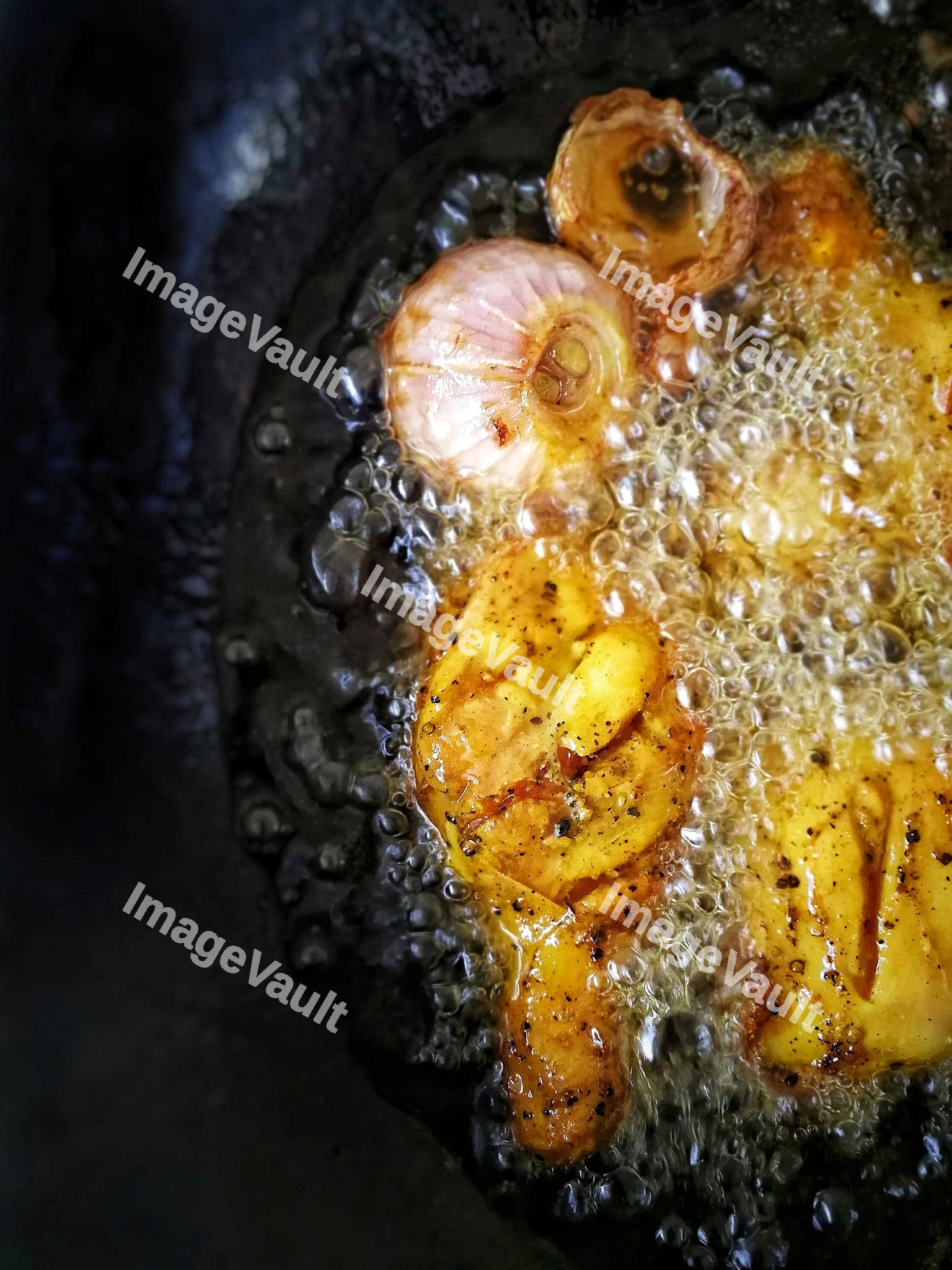 Chicken legs in the boiling oil